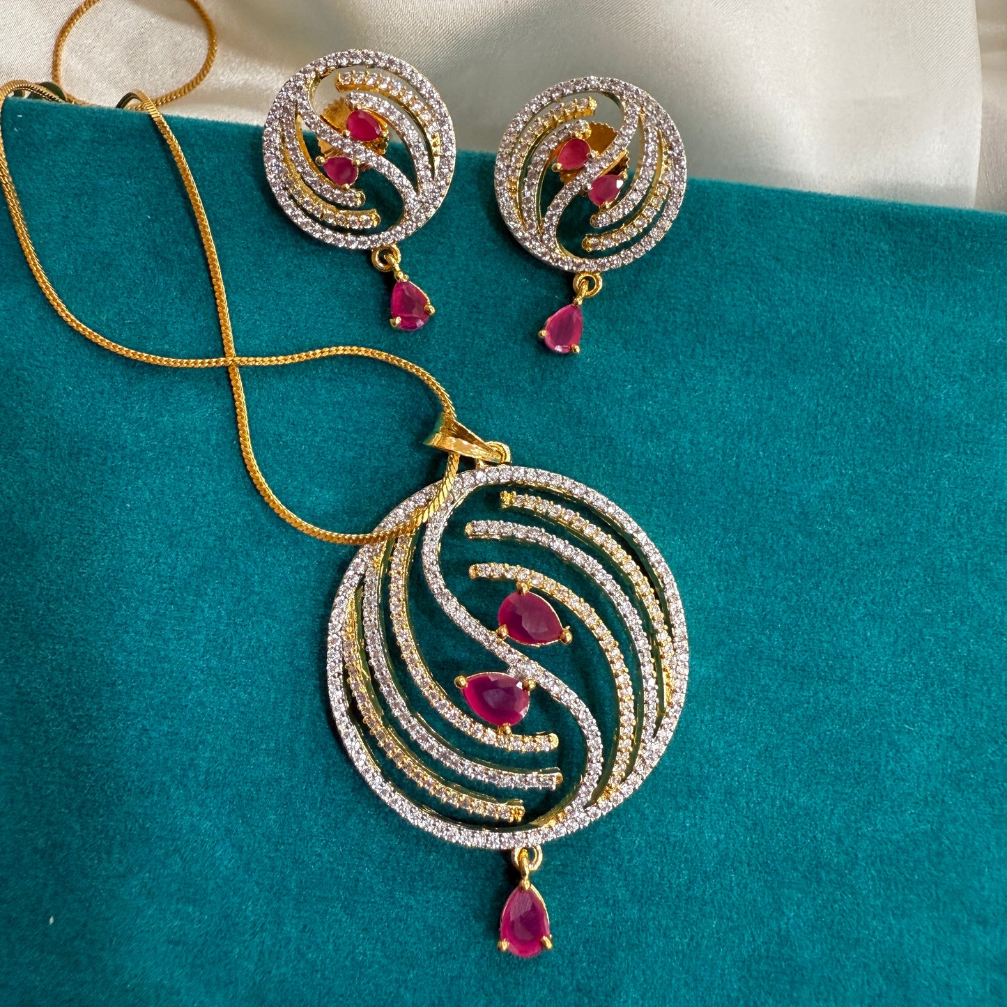 Captivating Swirl American Diamond Pendant Set