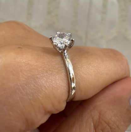 Minimalist solitaire ring
